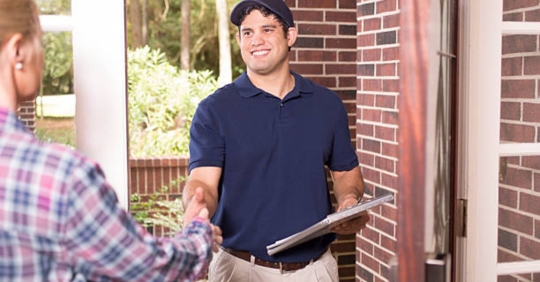 pest control technician and client